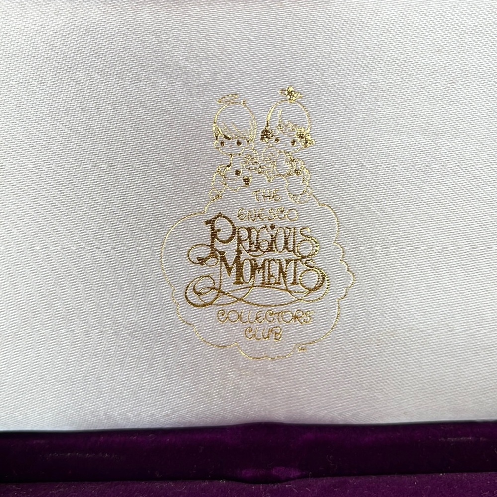 Precious moments collectors club medallions